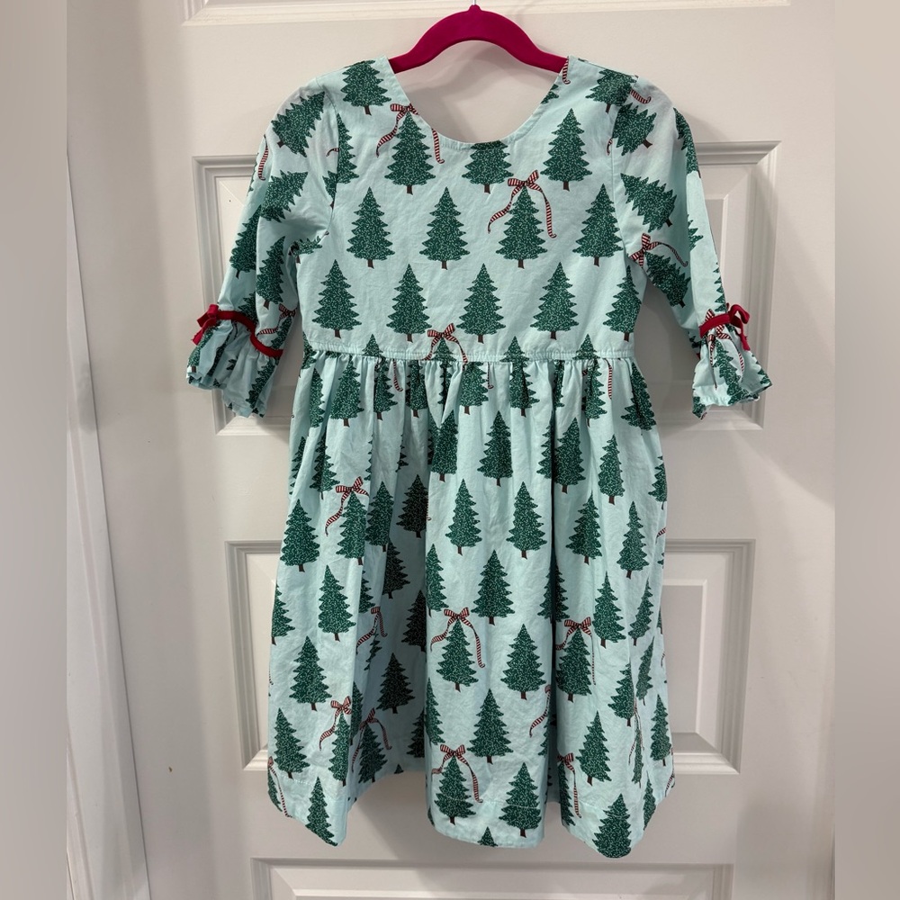 Pink Chicken Christmas Tree Dress, Blue  background and Red ribbon